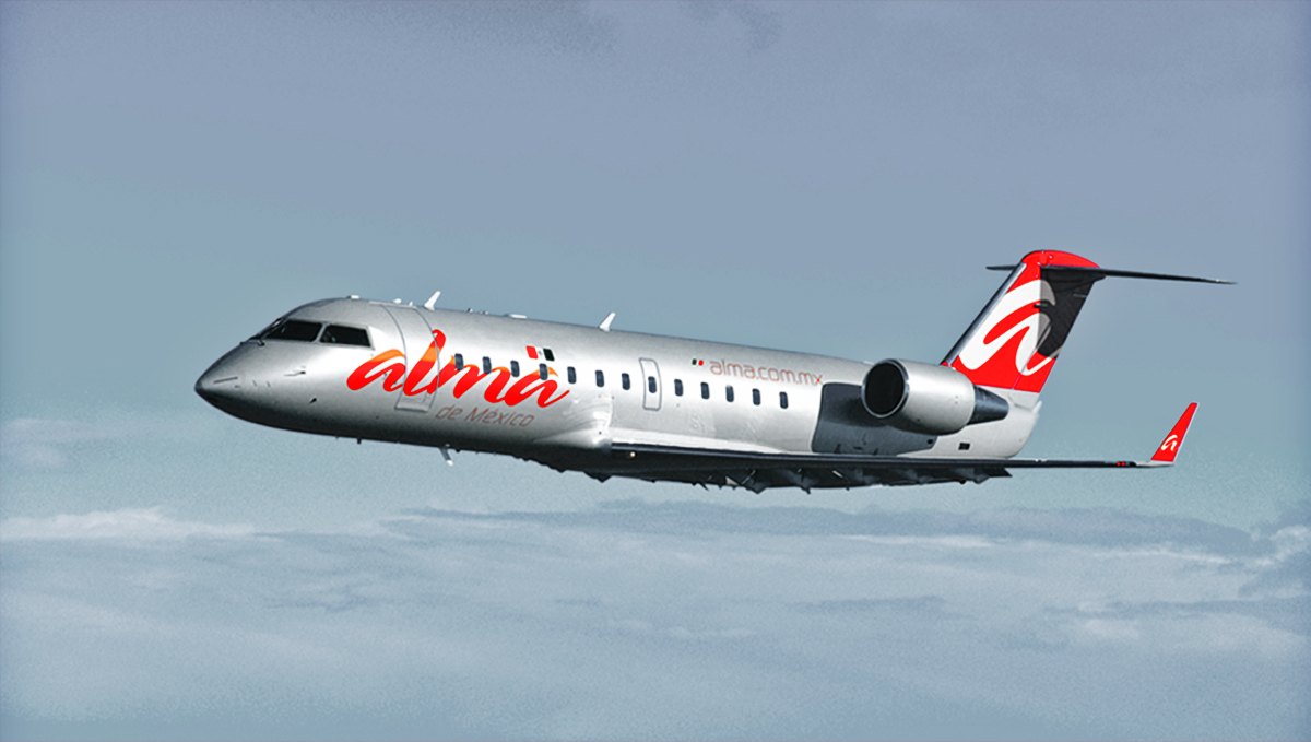 ALMA regional jet in flight in the new livery
